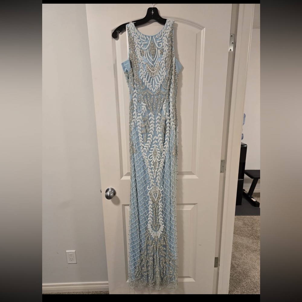 Elegant Blue Dress with White and Silver Beads